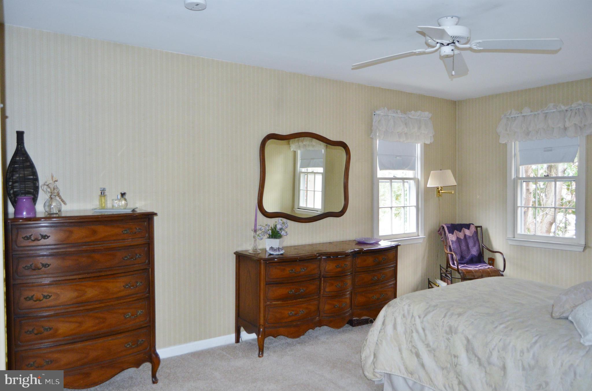 2017 Hopefield Road Silver Spring, MD 20905 - Photo 16 of 30 a bedroom with a bed and a dresser