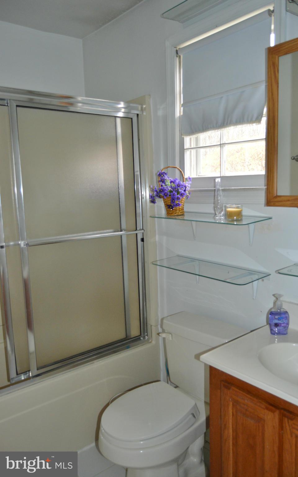 2017 Hopefield Road Silver Spring, MD 20905 - Photo 18 of 30 a bathroom with a toilet and a shower