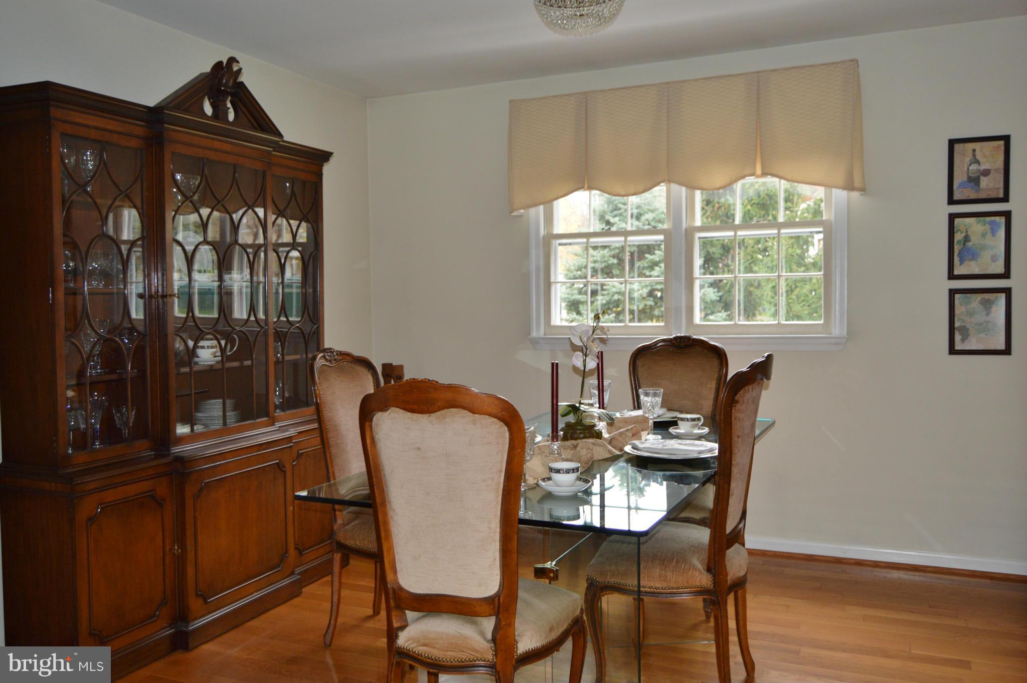 2017 Hopefield Road Silver Spring, MD 20905 - Photo 6 of 30 a view of a dining room with furniture window and wooden floor