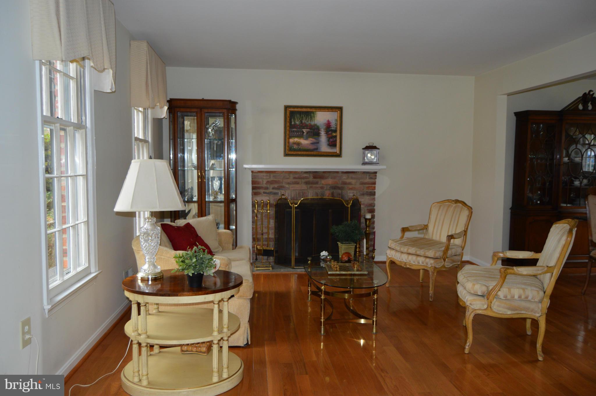 2017 Hopefield Road Silver Spring, MD 20905 - Photo 7 of 30 a living room with furniture a window and a fireplace