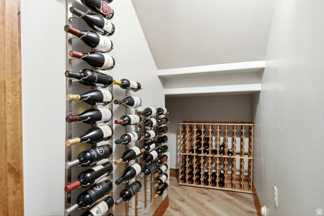 3148 Lower Saddleback Road Park City, UT 84098 - Photo 43 of 67 Dedicated wine storage space featuring multiple wall-mounted metal racks and a freestanding wooden wine rack