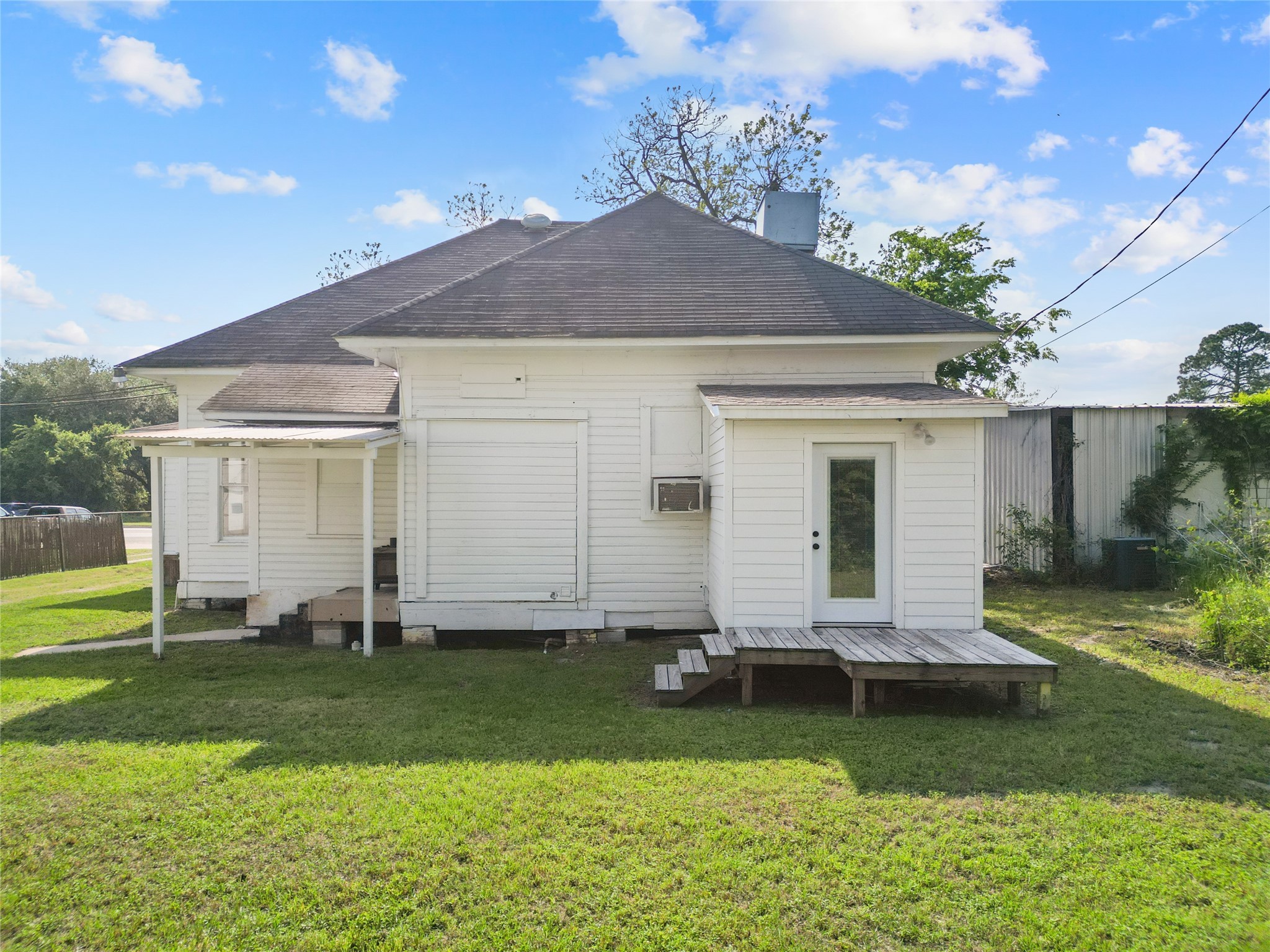 327 South Robb Street Trinity, TX 75862 - Photo 16 of 20 a front view of a house with a yard