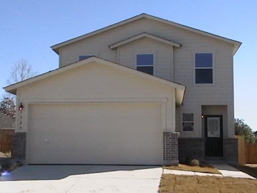 5526 Spring Walk San Antonio, TX 78247 - Photo 1 of 1 a front view of a house with a yard