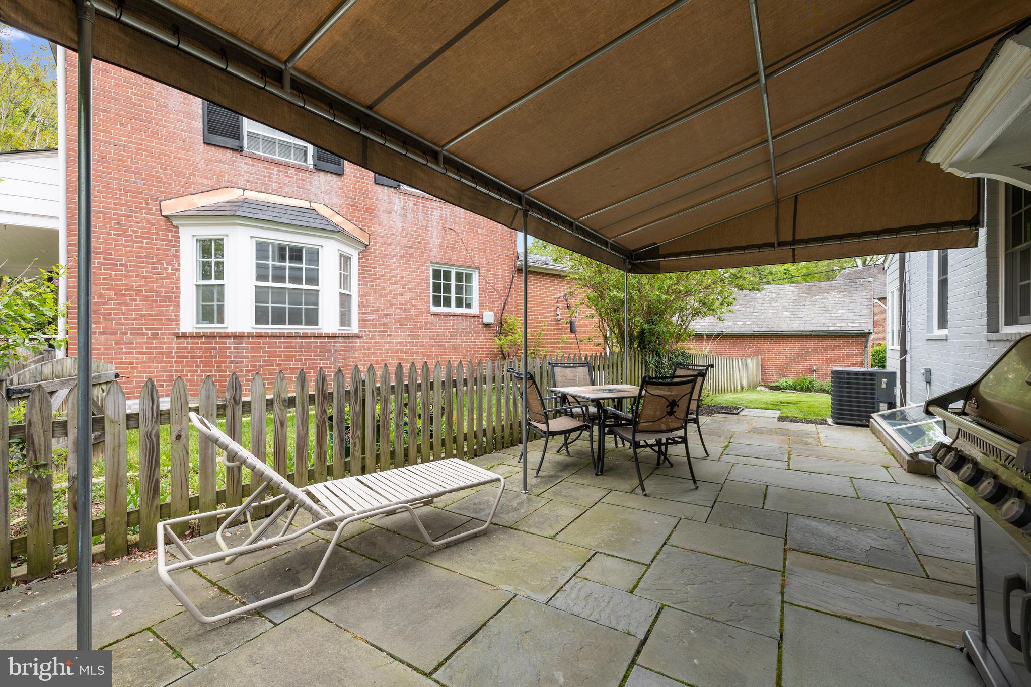 307 Broadmoor Road Baltimore, MD 21212 - Photo 47 of 55 The blue stone patio is off the side of the house.
