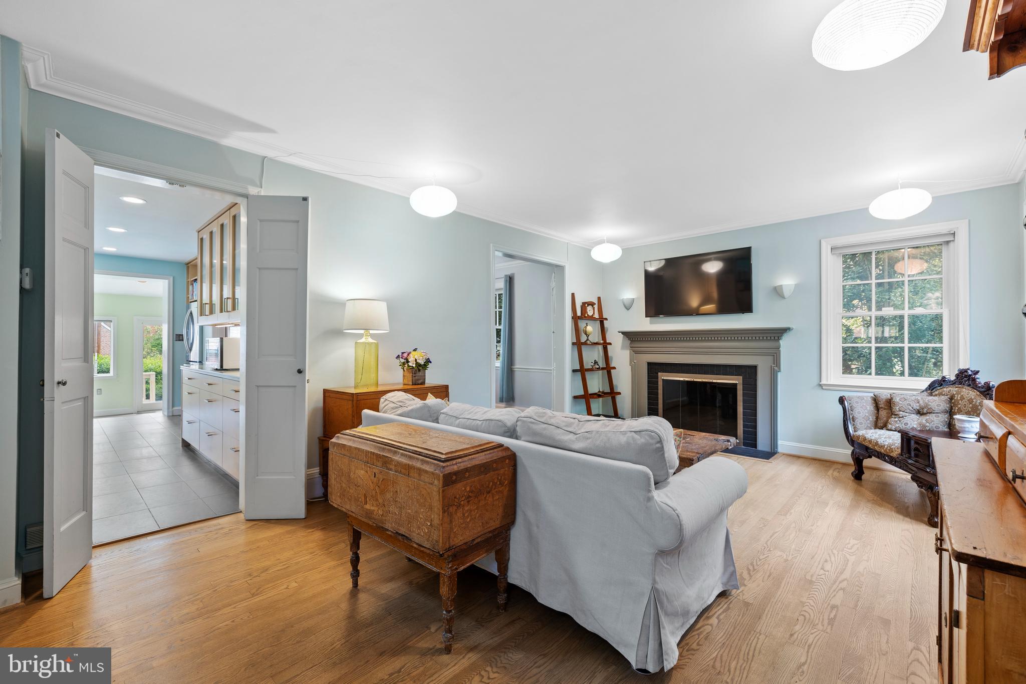 307 Broadmoor Road Baltimore, MD 21212 - Photo 7 of 55 The living room has a fireplace.
