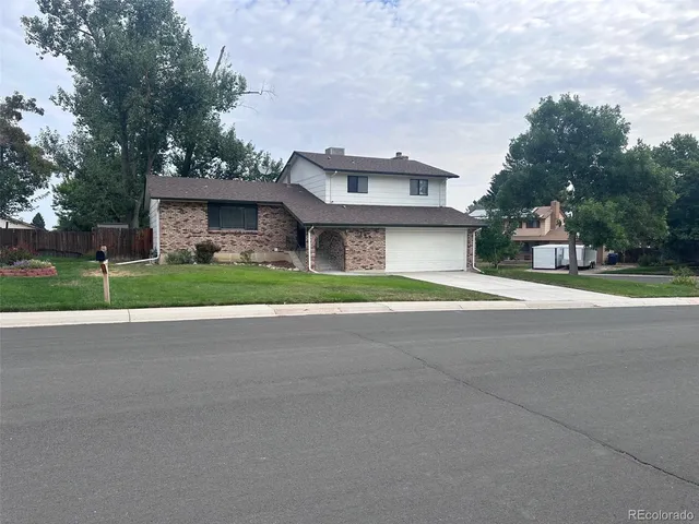 a view of road with house in background