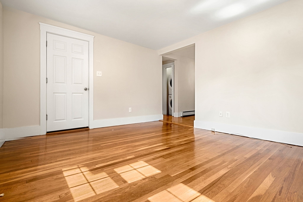 12 Chestnut Street Danvers, MA 01923 - Photo 37 of 37 a view of an empty room and wooden floor