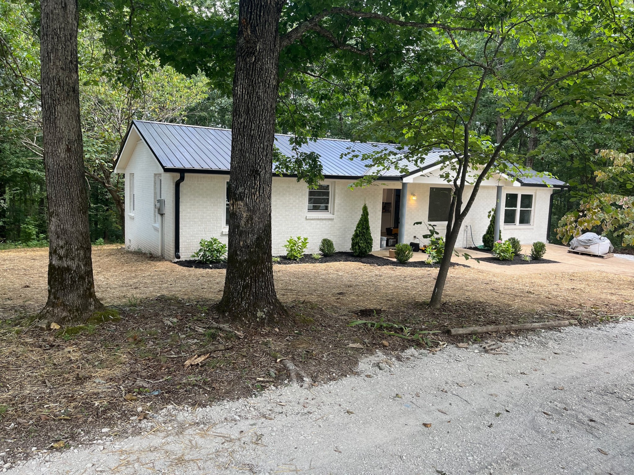 6167 Parker Road Lyles, TN 37098 - Photo 3 of 28 a front view of a house with a yard
