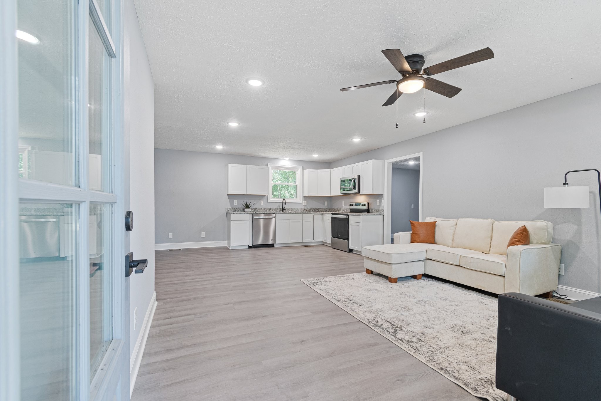 6167 Parker Road Lyles, TN 37098 - Photo 8 of 28 a living room with furniture and kitchen view