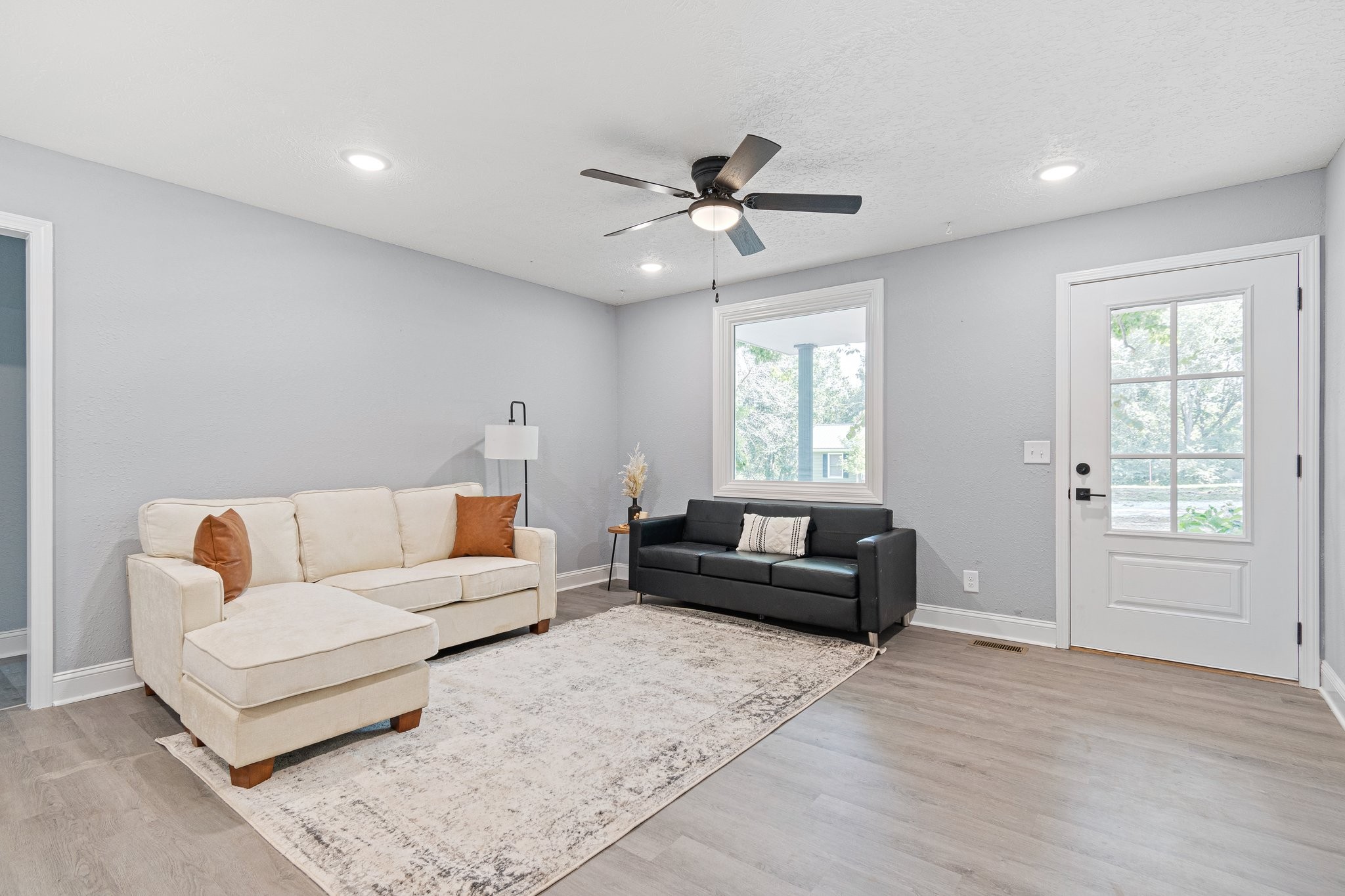 6167 Parker Road Lyles, TN 37098 - Photo 9 of 28 a living room with furniture and a large window