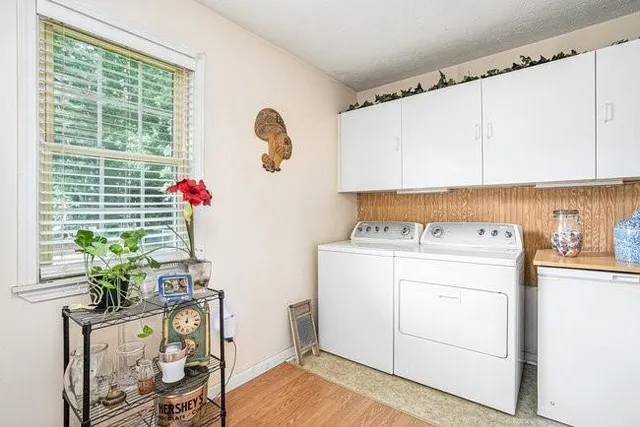 a utility room with washer and dryer