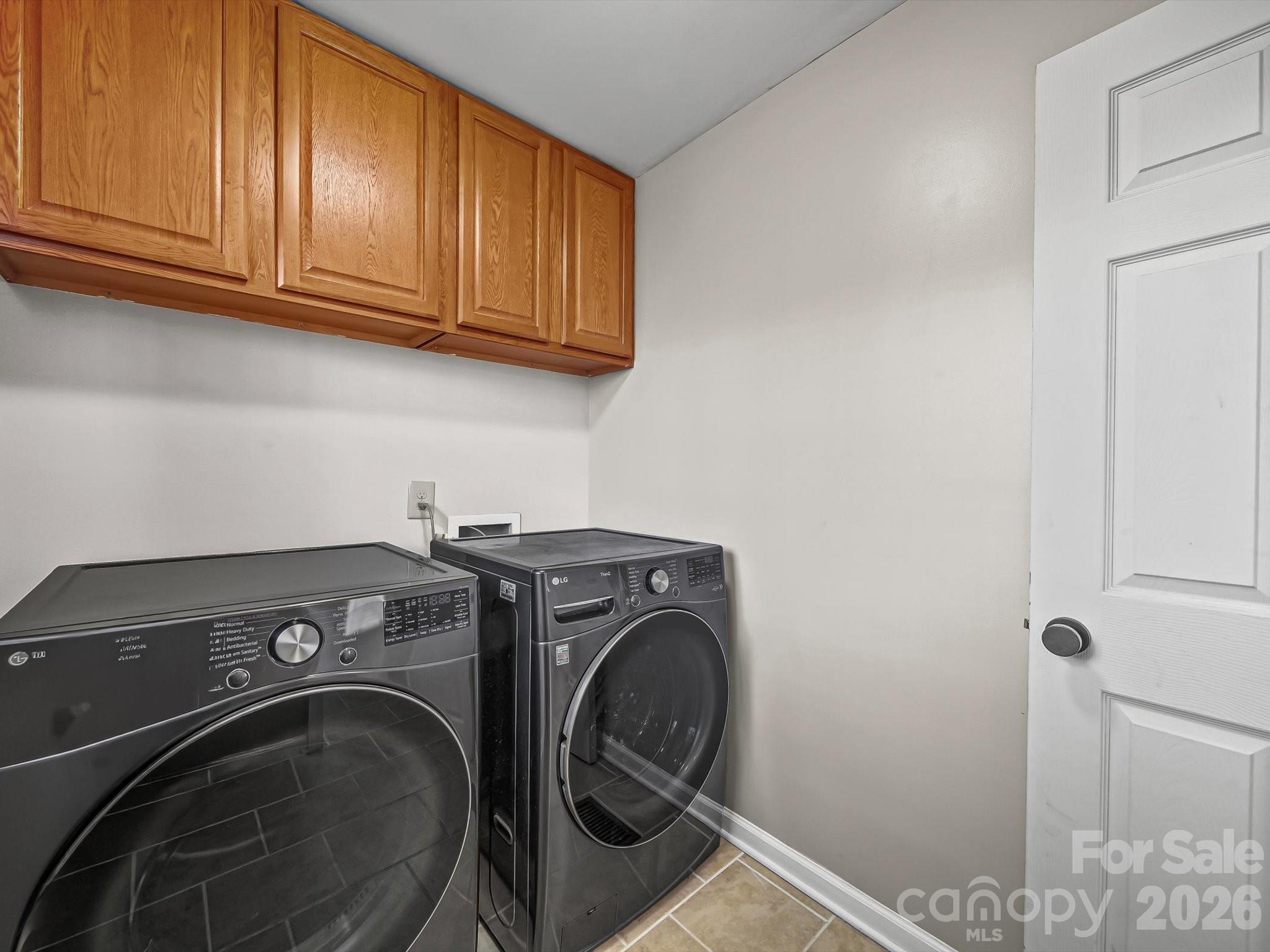 10351 Fink Road Mount Pleasant, NC 28124 - Photo 12 of 20 a utility room with dryer and washer