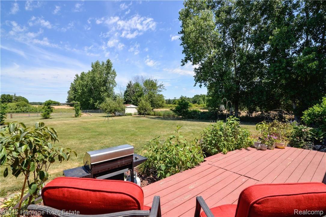 10100 Chase Lake Road Fowlerville, MI 48836 - Photo 34 of 41 Beautiful Yard