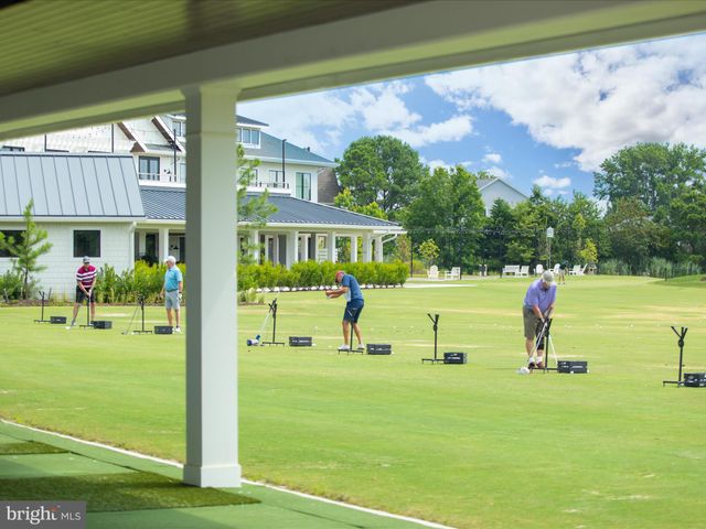 a front view of a house with a garage