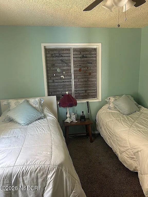 766 South 6th Street Grover Beach, CA 93433 - Photo 13 of 20 a bedroom with a bed and window