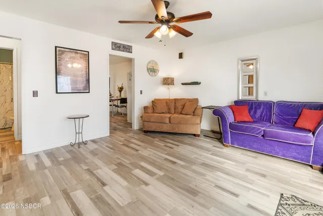 a living room with furniture and a couch