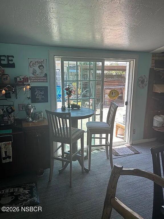 766 South 6th Street Grover Beach, CA 93433 - Photo 8 of 20 a view of a dining room with furniture window and outside view