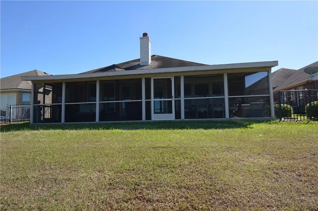 a view of a backyard with plants