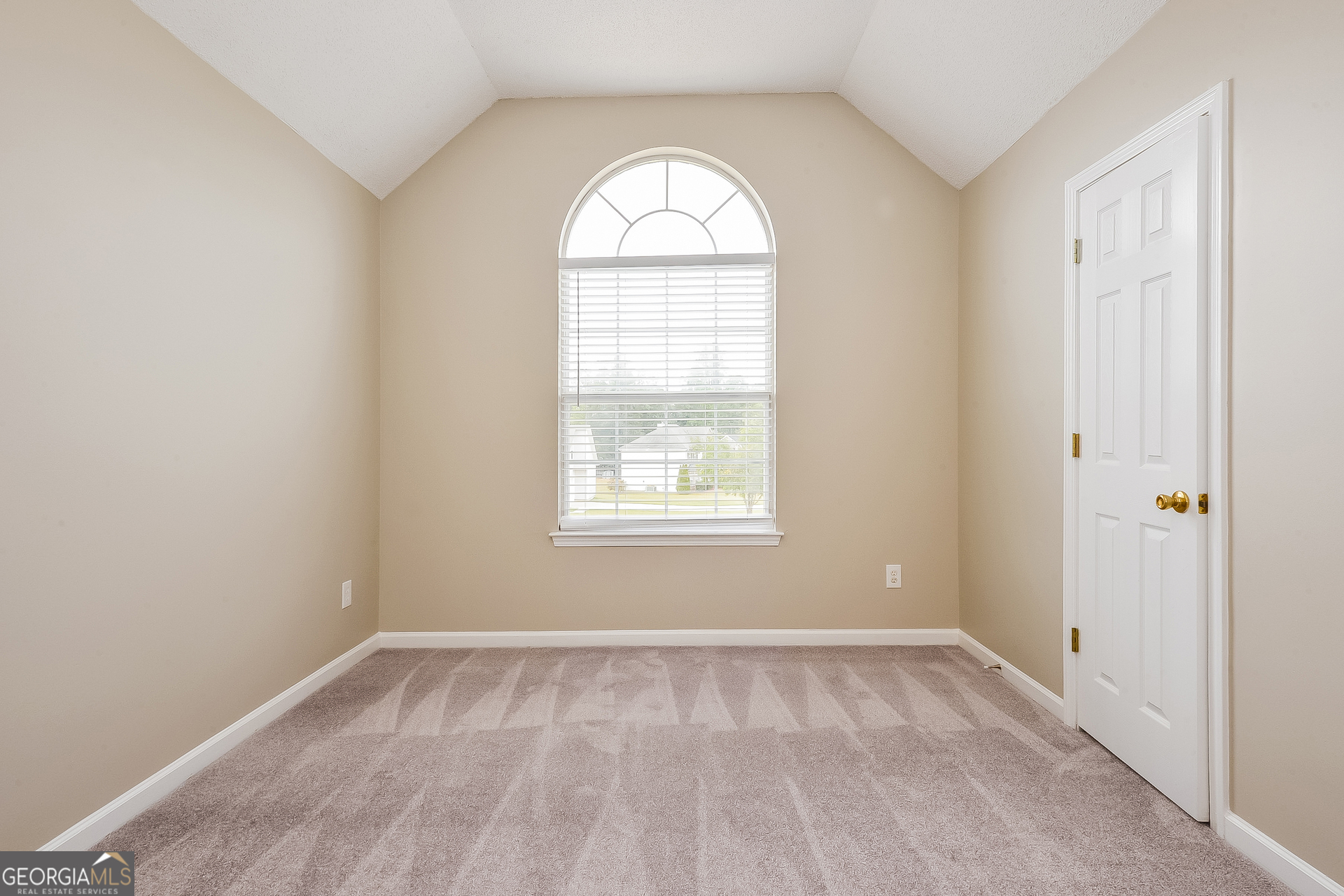 1707 Deer Crossing Way Jonesboro, GA 30236 - Photo 12 of 17 an empty room with a window