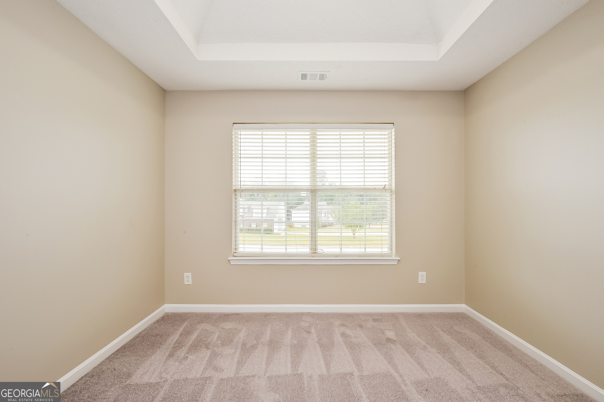1707 Deer Crossing Way Jonesboro, GA 30236 - Photo 8 of 17 an empty room with a window