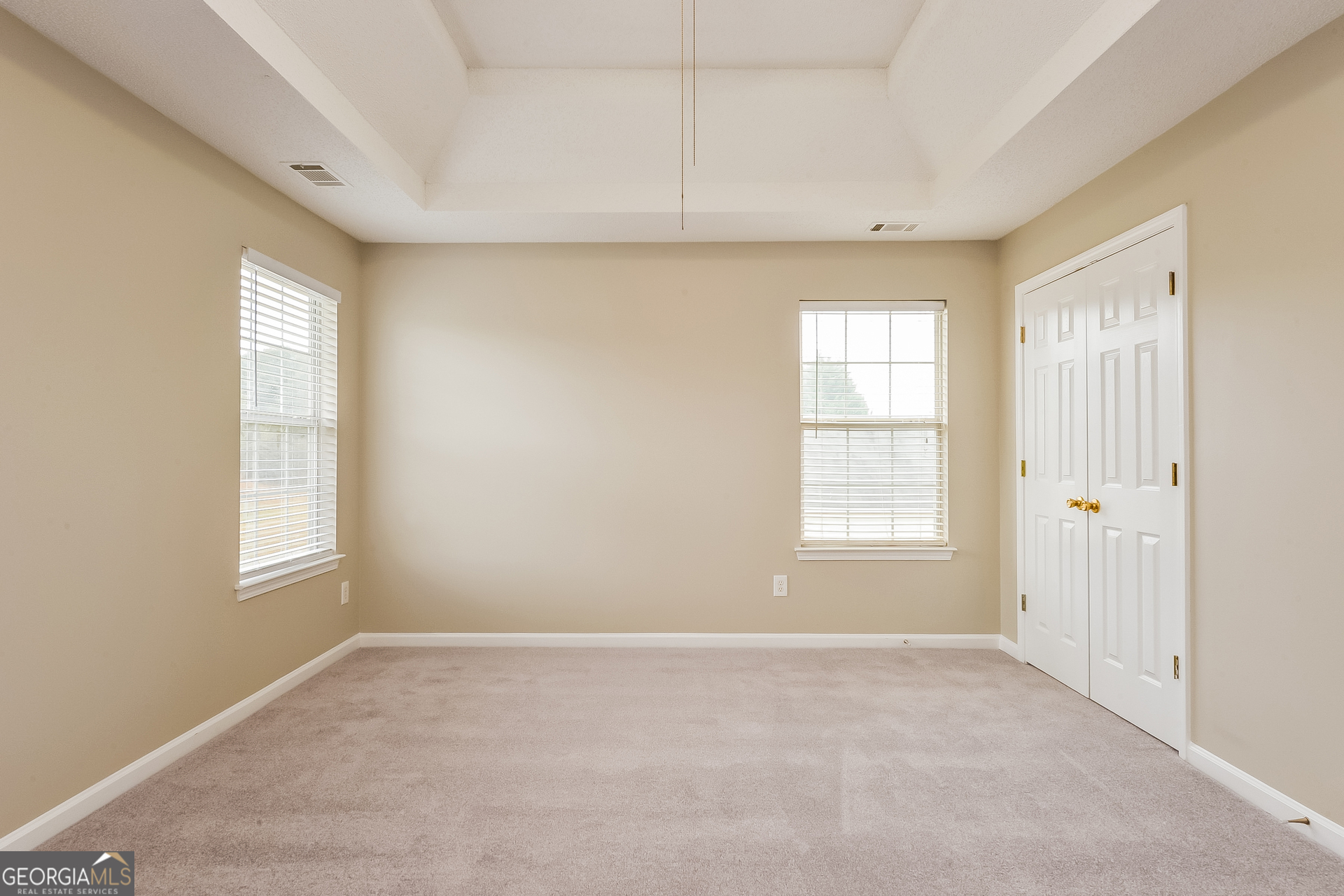 1707 Deer Crossing Way Jonesboro, GA 30236 - Photo 9 of 17 a view of an empty room with a window