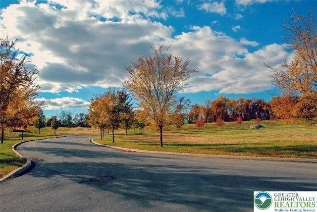 a view of swimming pool with an outdoor space and seating area