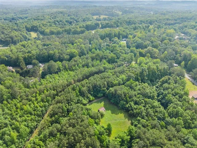 an aerial view of residential house with outdoor space