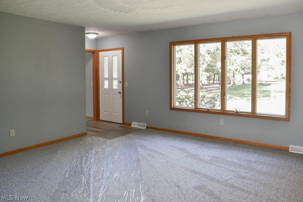 5064 Taylor Road Atwater, OH 44201 - Photo 3 of 21 Sun-filled living room.