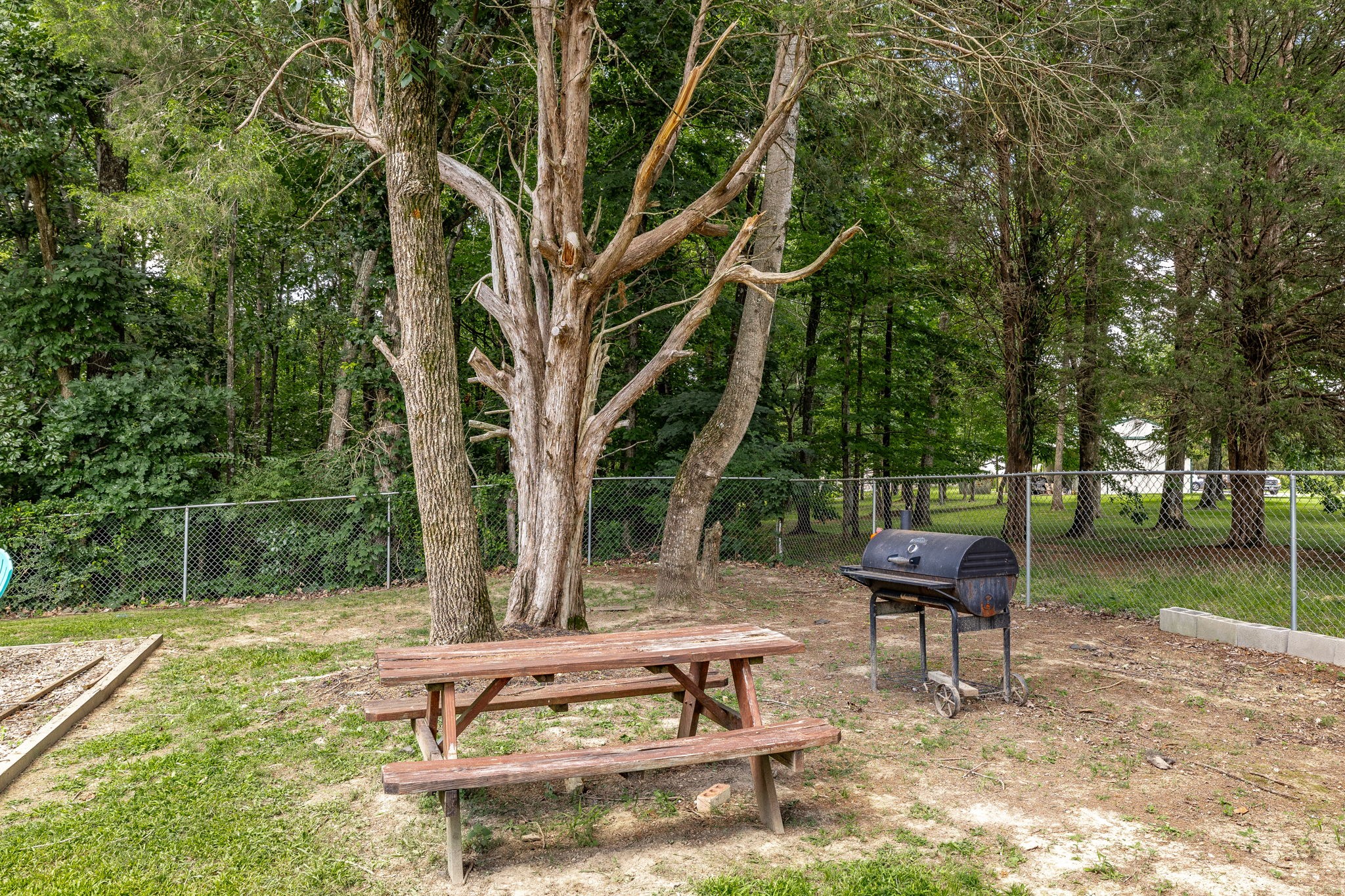 2860 Morgan Road Joelton, TN 37080 - Photo 42 of 45 a backyard of a house with table and chairs