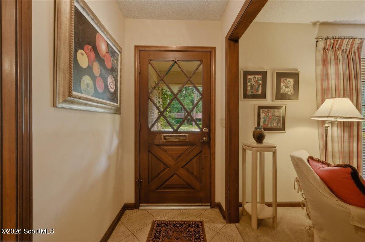 554 Old Plantation Road Jekyll Island, GA 31527 - Photo 8 of 58 Front Door to the front living room