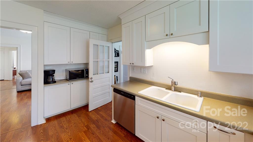 141 Wallaby Road Cherryville, NC 28021 - Photo 17 of 47 a kitchen with granite countertop white cabinets and white appliances