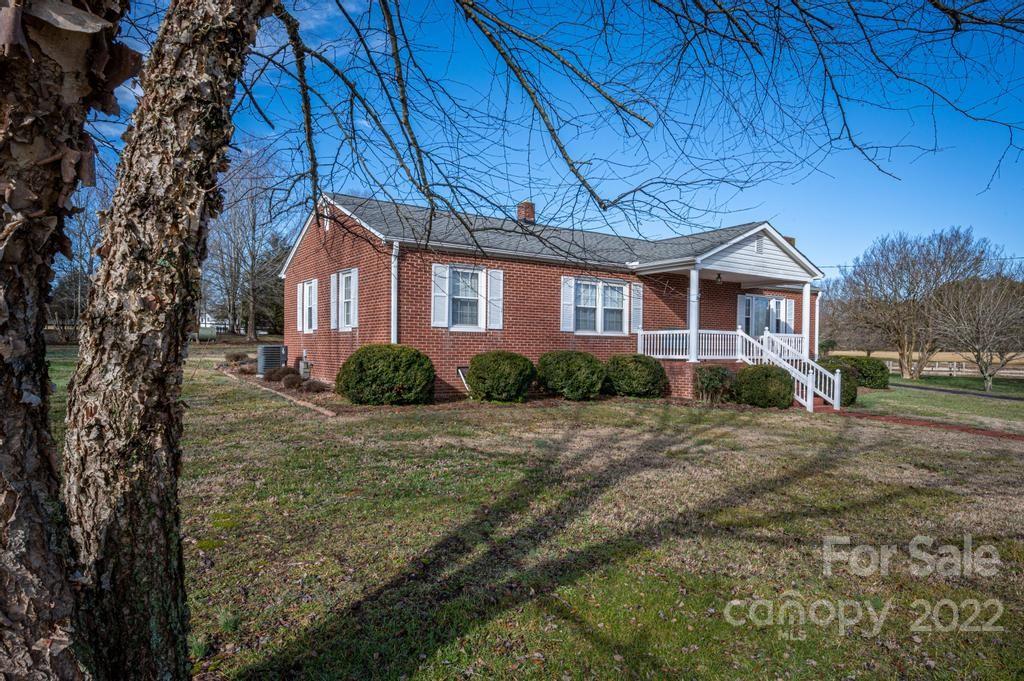 141 Wallaby Road Cherryville, NC 28021 - Photo 2 of 47 a front view of a house with a yard