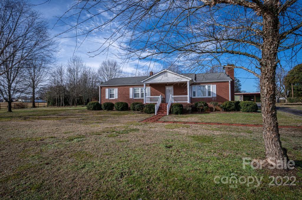 141 Wallaby Road Cherryville, NC 28021 - Photo 3 of 47 a front view of a house with a yard