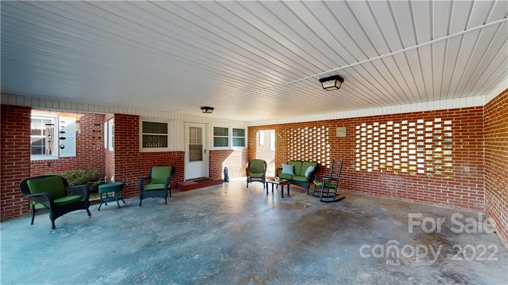 141 Wallaby Road Cherryville, NC 28021 - Photo 31 of 47 a view of a livingroom with chairs and tables