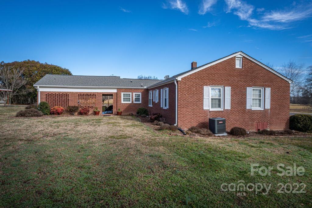 141 Wallaby Road Cherryville, NC 28021 - Photo 4 of 47 a front view of a house with a yard