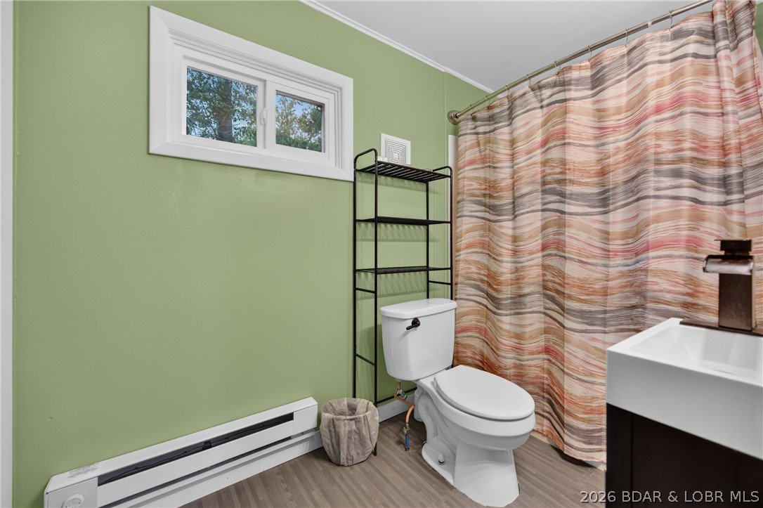 27116 Hard Rock Road Barnett, MO 65011 - Photo 13 of 47 Baseboard heat for extra warmth