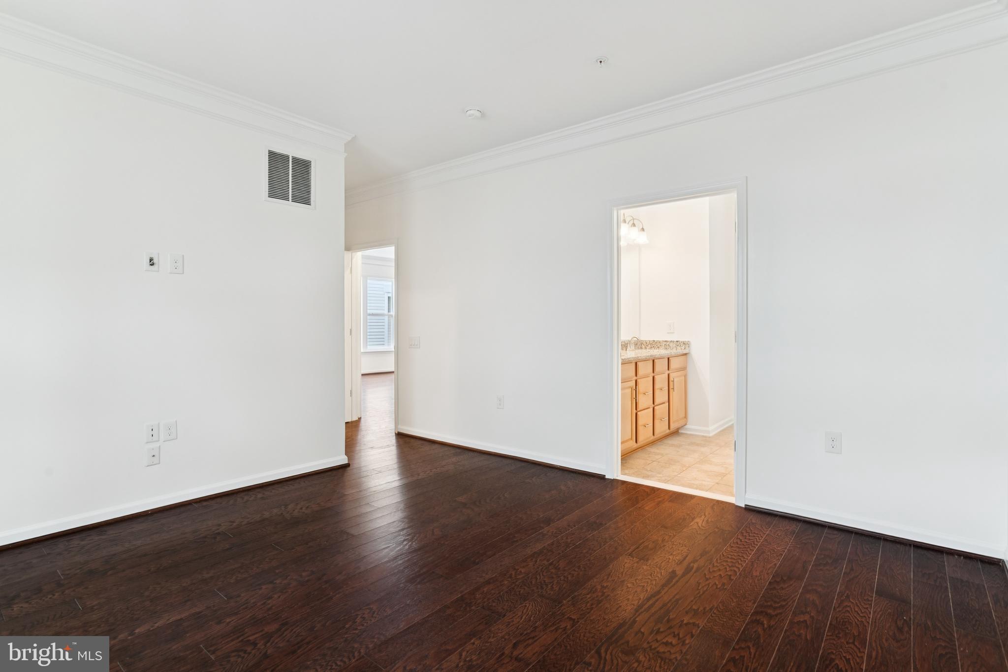 15 Point Bluff Street Fredericksburg, VA 22406 - Photo 16 of 25 an empty room with wooden floor and windows