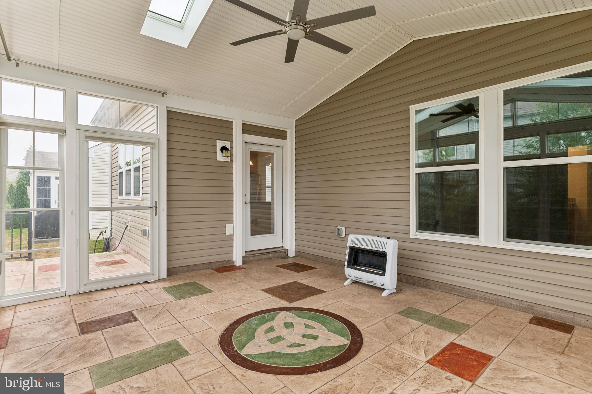 15 Point Bluff Street Fredericksburg, VA 22406 - Photo 24 of 25 a backyard of a house with table and chairs