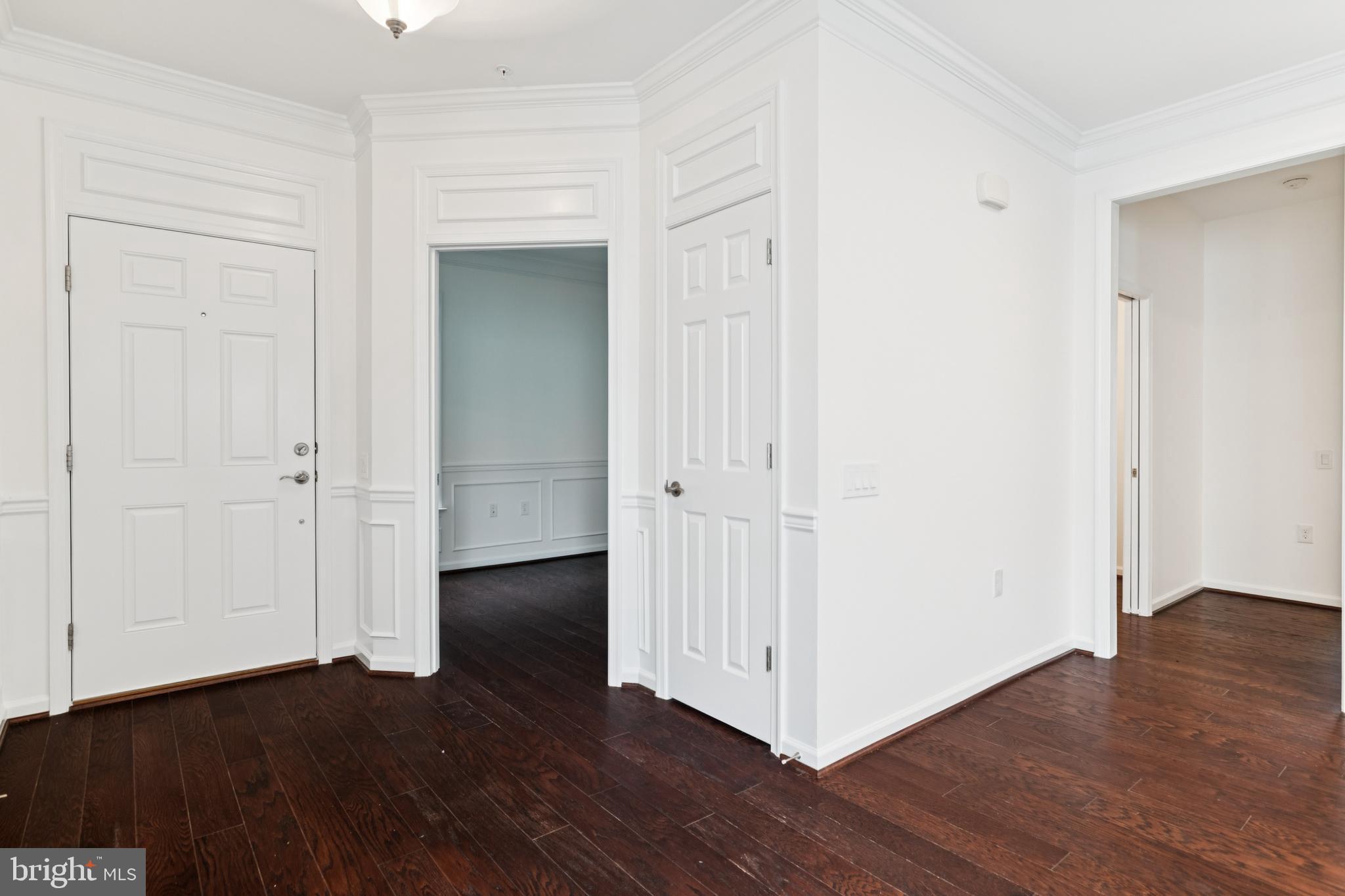 15 Point Bluff Street Fredericksburg, VA 22406 - Photo 3 of 25 an empty room with wooden floor & closet area
