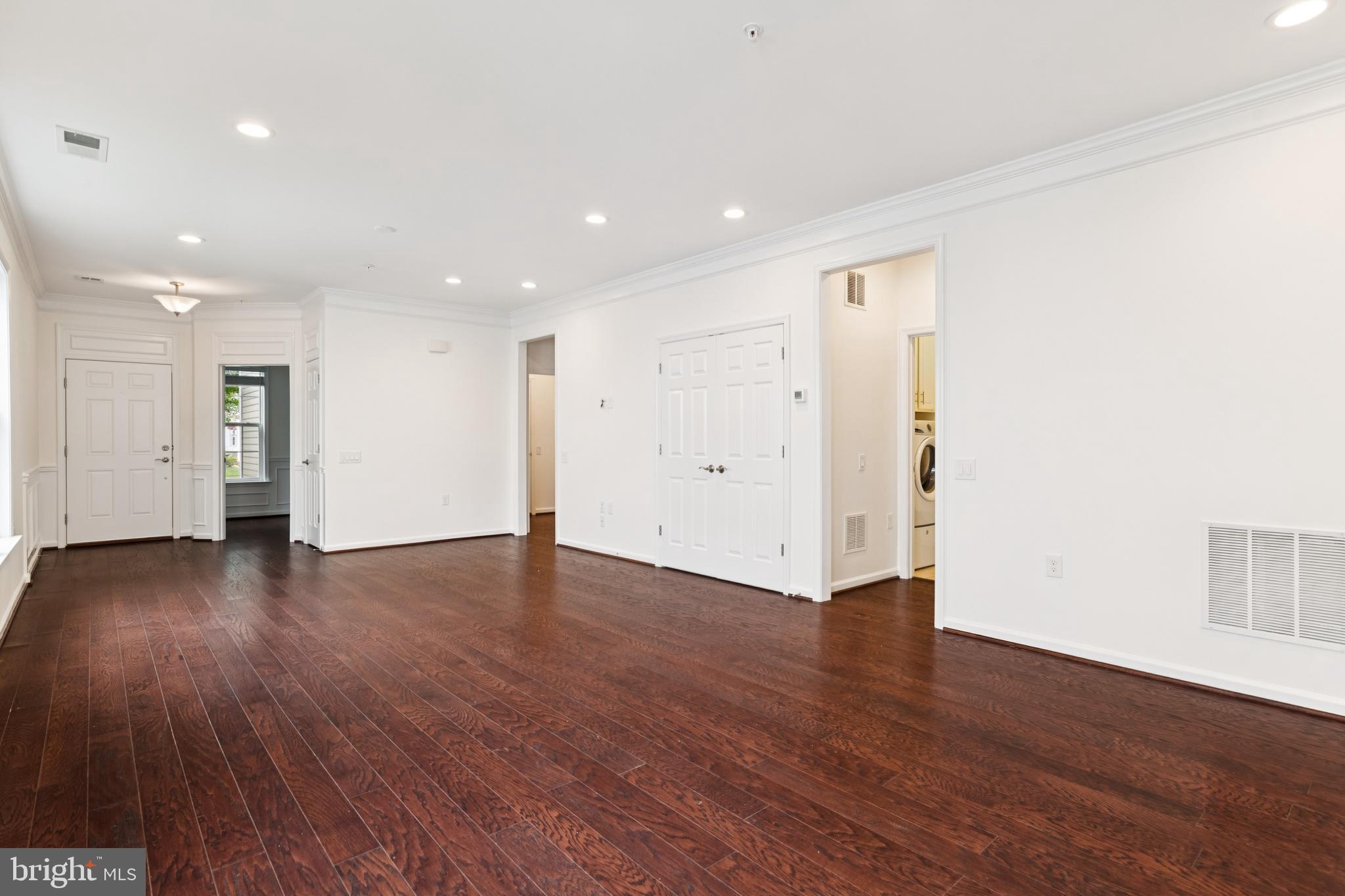 15 Point Bluff Street Fredericksburg, VA 22406 - Photo 7 of 25 a view of an empty room with wooden floor