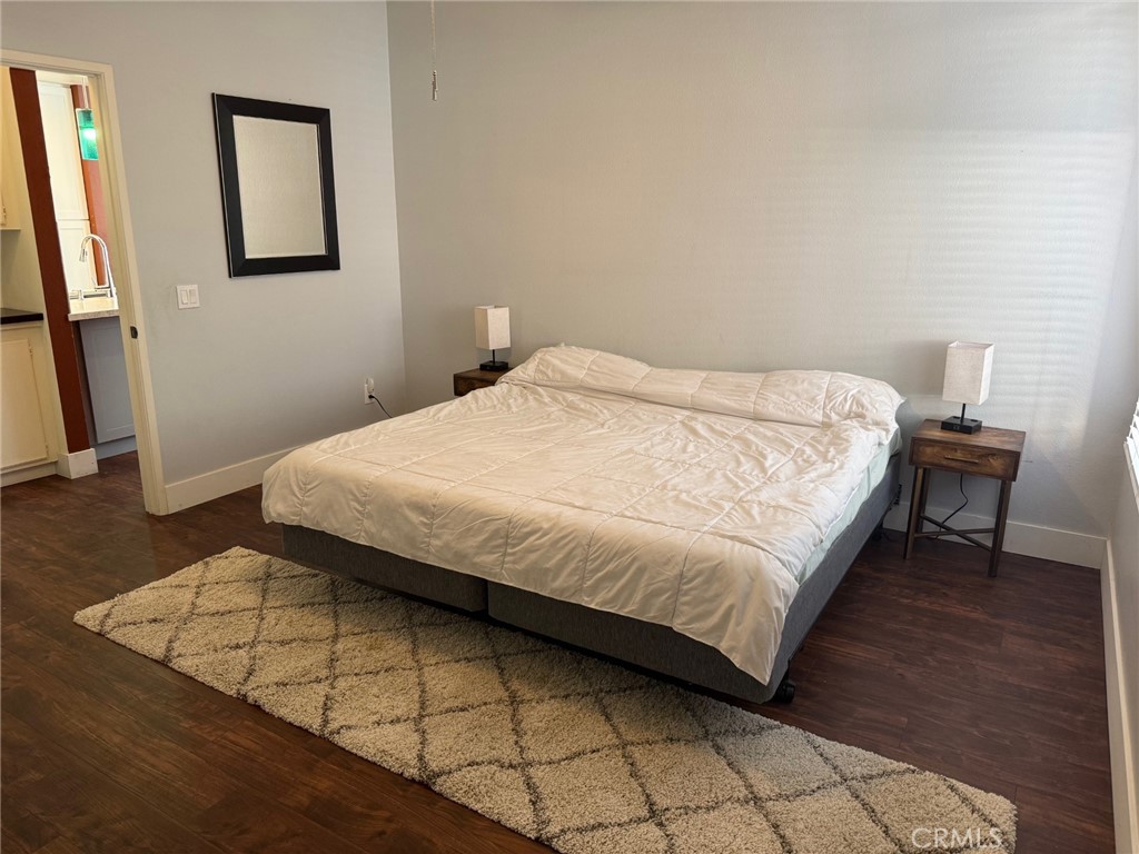 19431 Rue De Valore, Unit 14A Lake Forest, CA 92610 - Photo 13 of 26 a bedroom with a bed and a rug