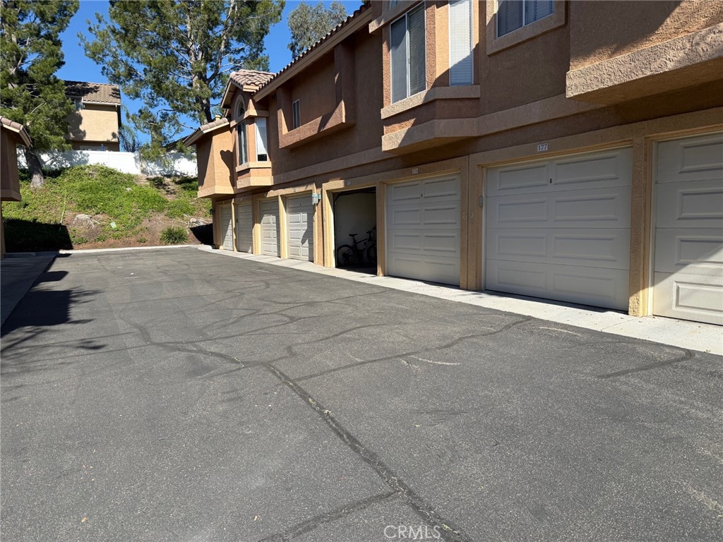 19431 Rue De Valore, Unit 14A Lake Forest, CA 92610 - Photo 17 of 26 Garage nearby