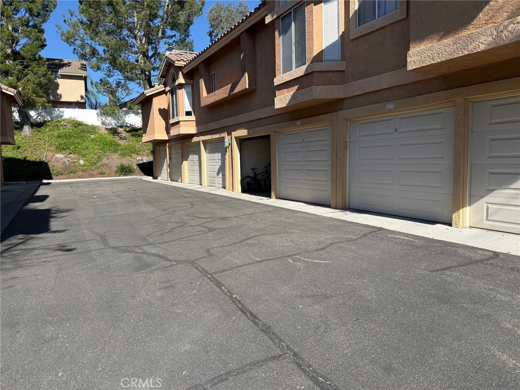 19431 Rue De Valore, Unit 14A Lake Forest, CA 92610 - Photo 4 of 23 Garage nearby