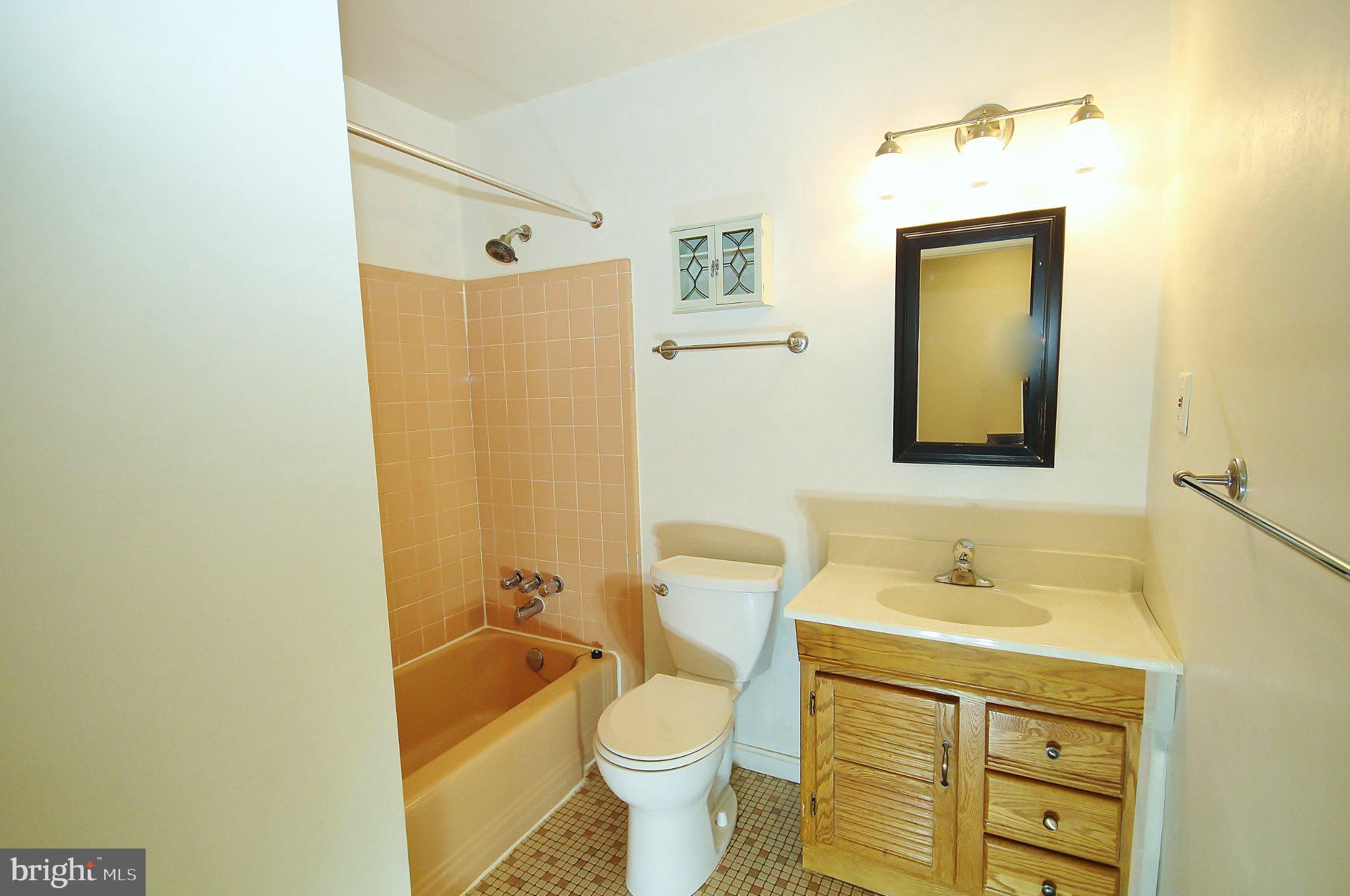 5504 Inverchapel Road Springfield, VA 22151 - Photo 18 of 51 Charming bathroom with vintage flair.