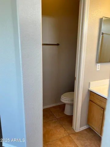 a bathroom with a toilet