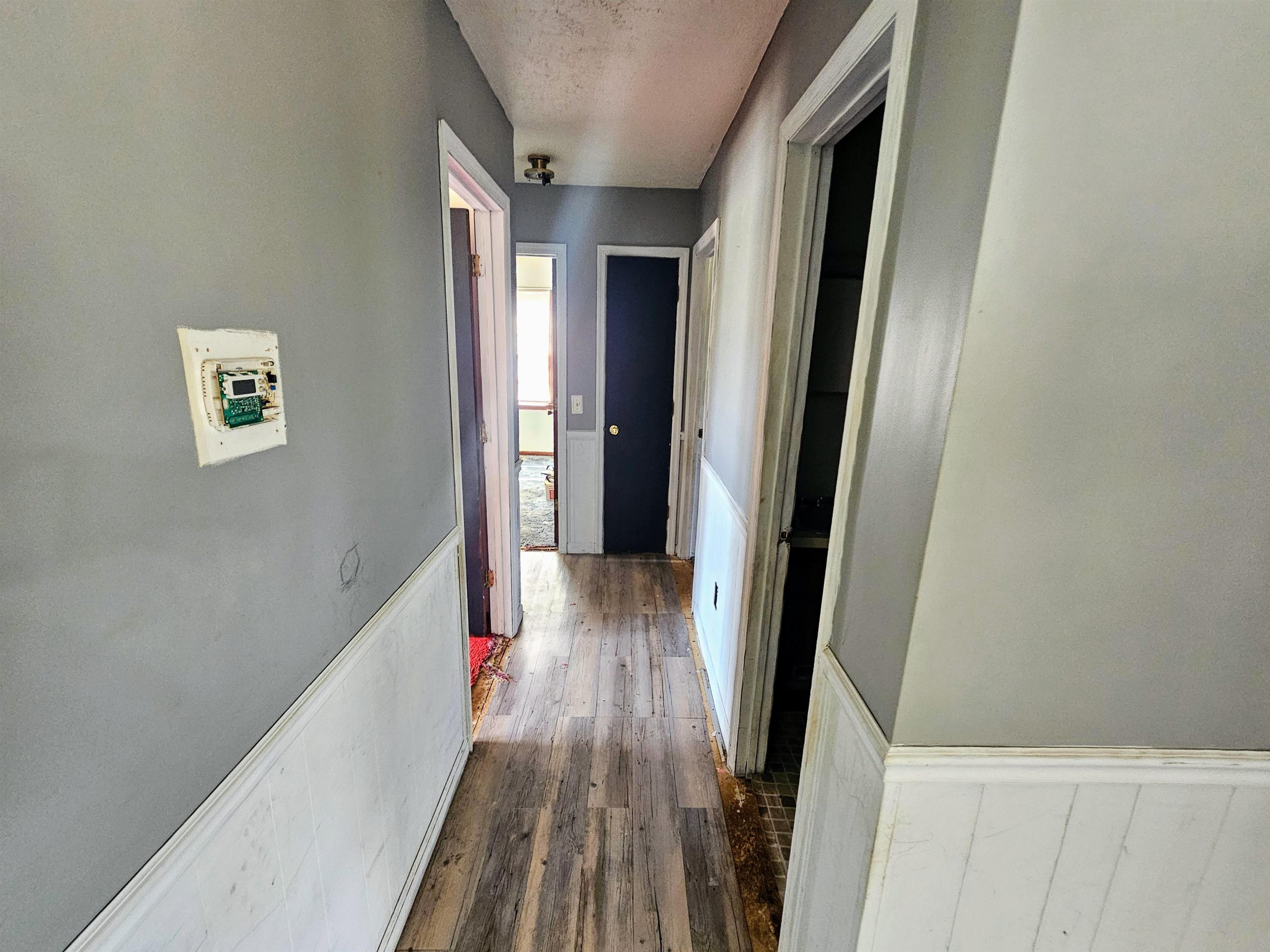 156 Small Road Sellers, SC 29592 - Photo 11 of 32 Corridor with dark hardwood / wood-style floors