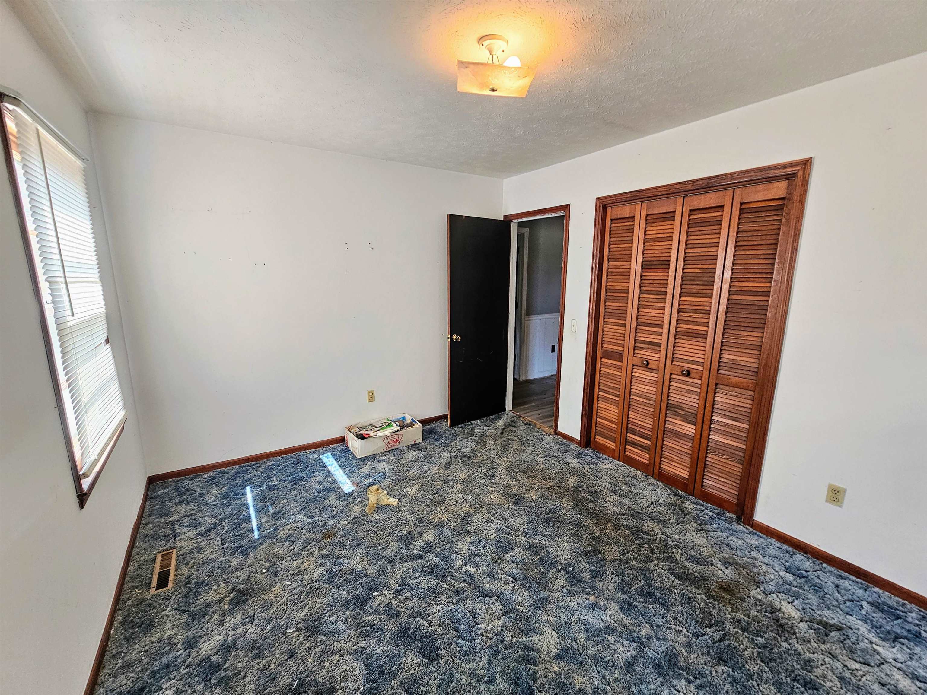 156 Small Road Sellers, SC 29592 - Photo 16 of 32 Unfurnished bedroom featuring a textured ceiling,