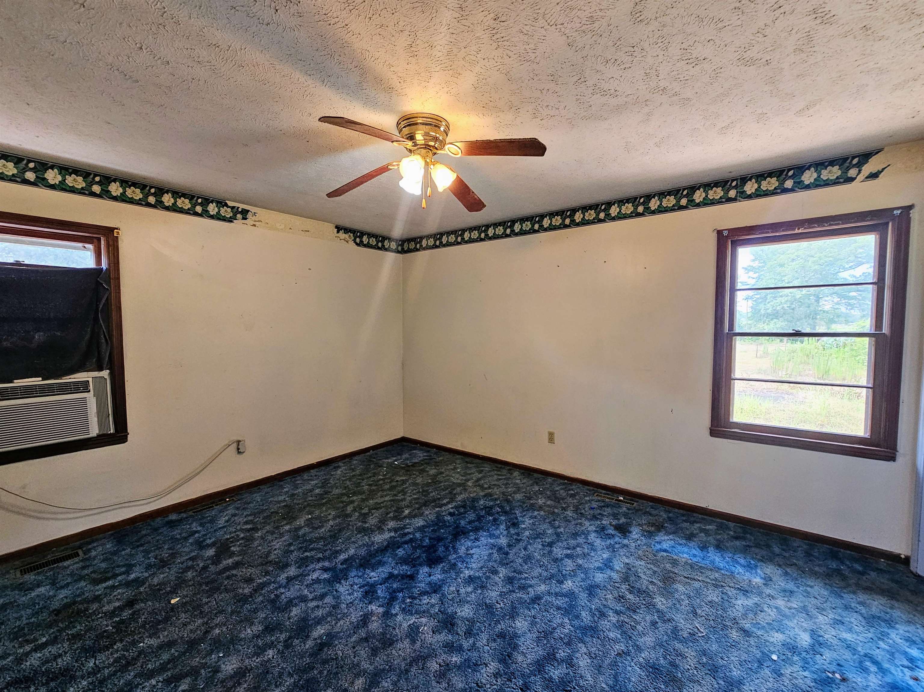 156 Small Road Sellers, SC 29592 - Photo 17 of 32 Carpeted spare room with a textured ceiling and ce