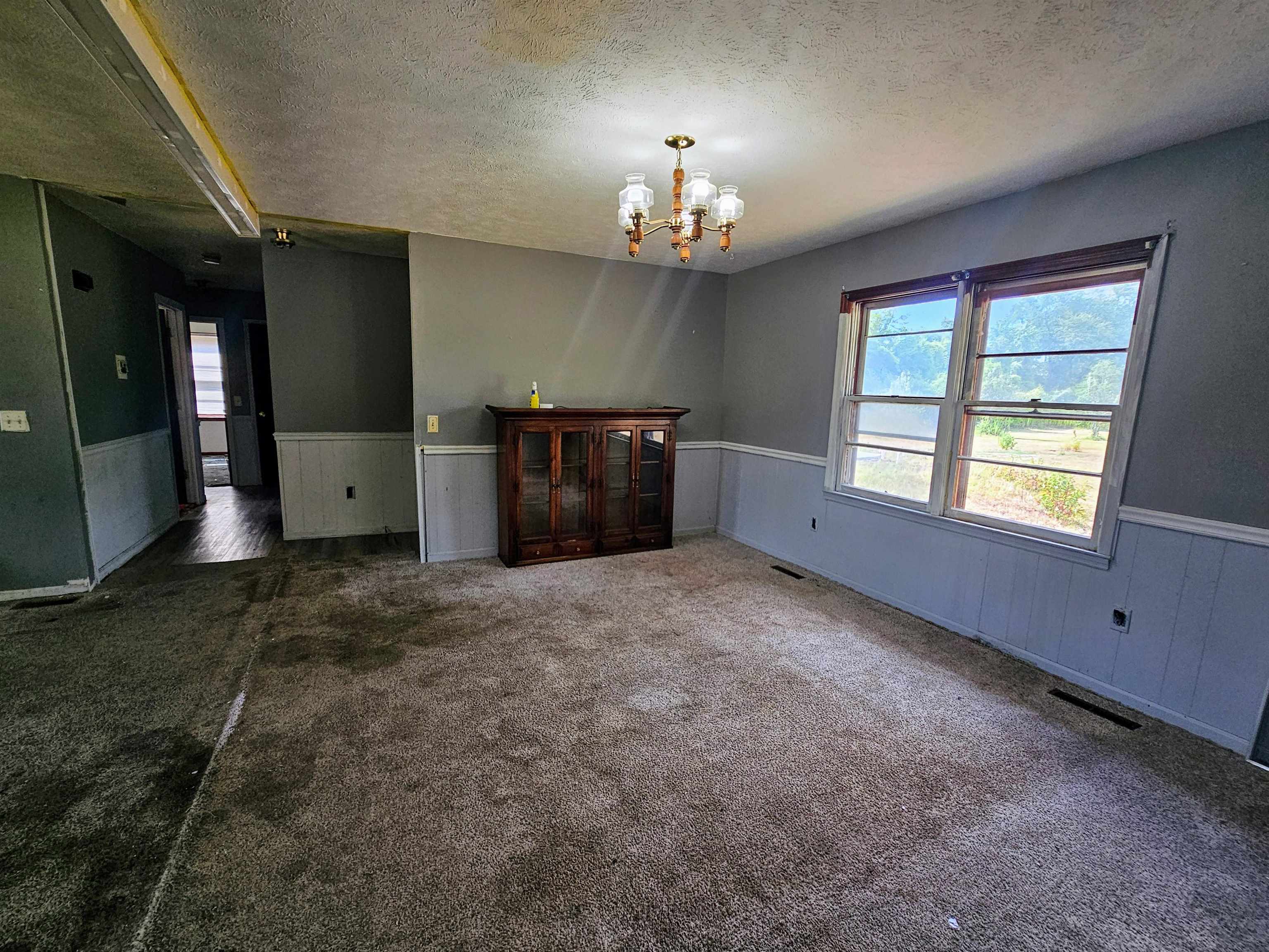 156 Small Road Sellers, SC 29592 - Photo 10 of 32 Unfurnished living room featuring a notable chande