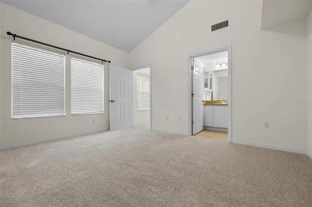 an empty room with windows